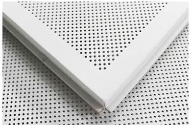 Two pieces of white painted perforated sheet.
